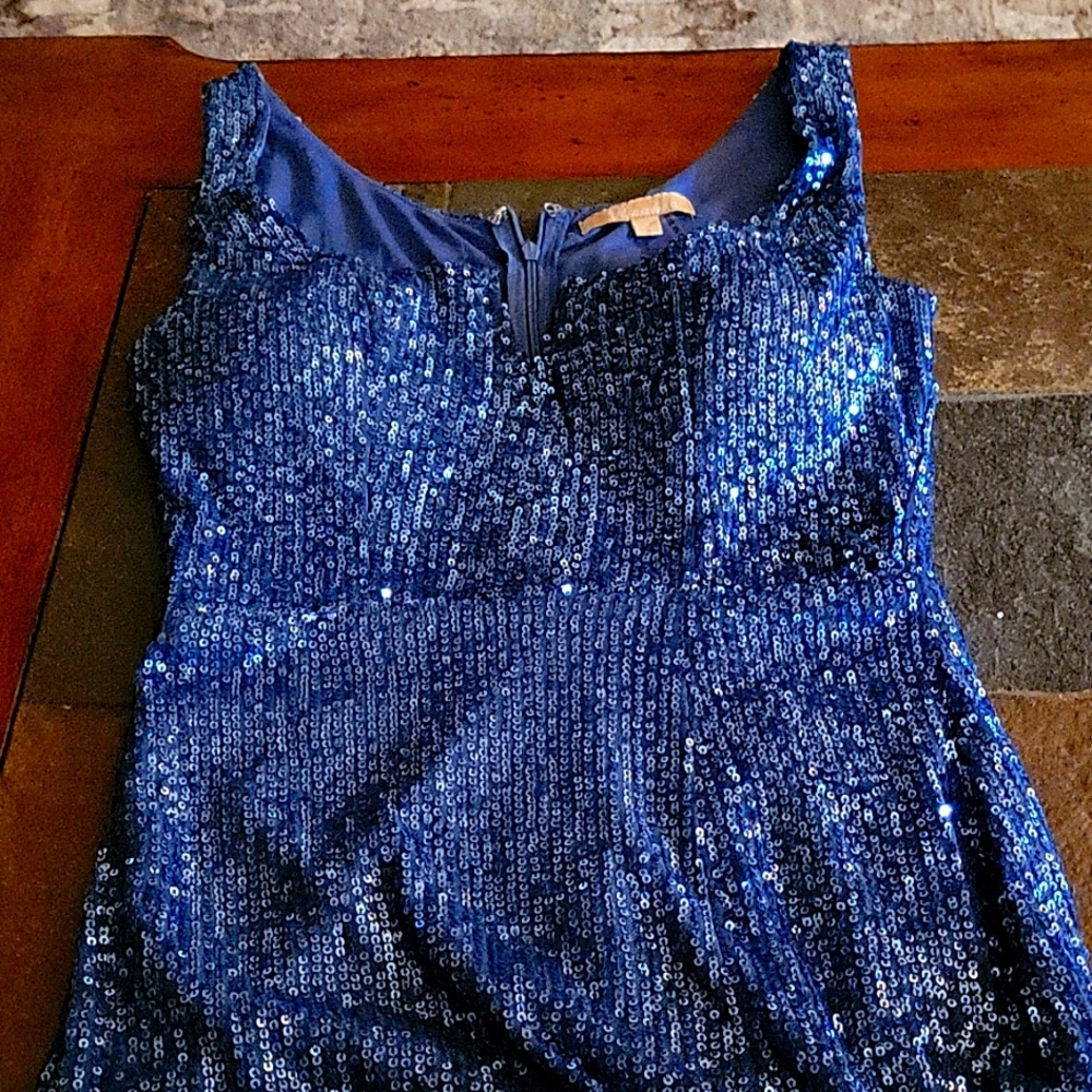 Formal long slit on the front side sequin gown.